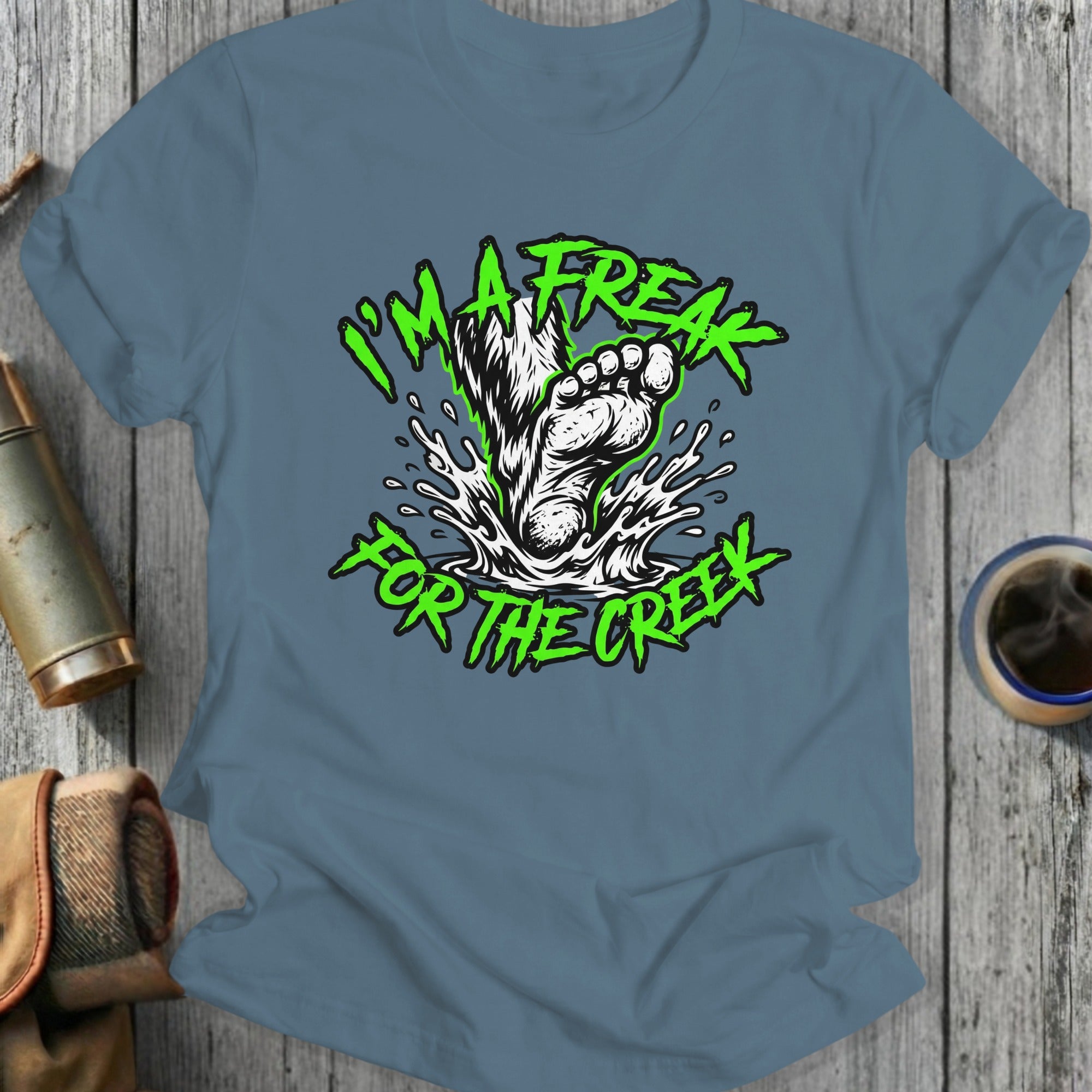 Green text "I'M A FREAK FOR THE CREEK" over splashing water and a foot.