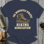 Navy t-shirt with hiking boot graphic and text "The Moderately Athletic Hiking Association".