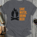 Dark grey t-shirt with orange text "SAVE WATER, DRINK BEER" above a campfire graphic.