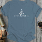 Blue t-shirt with white graphic of campfire and text "a little burned out."