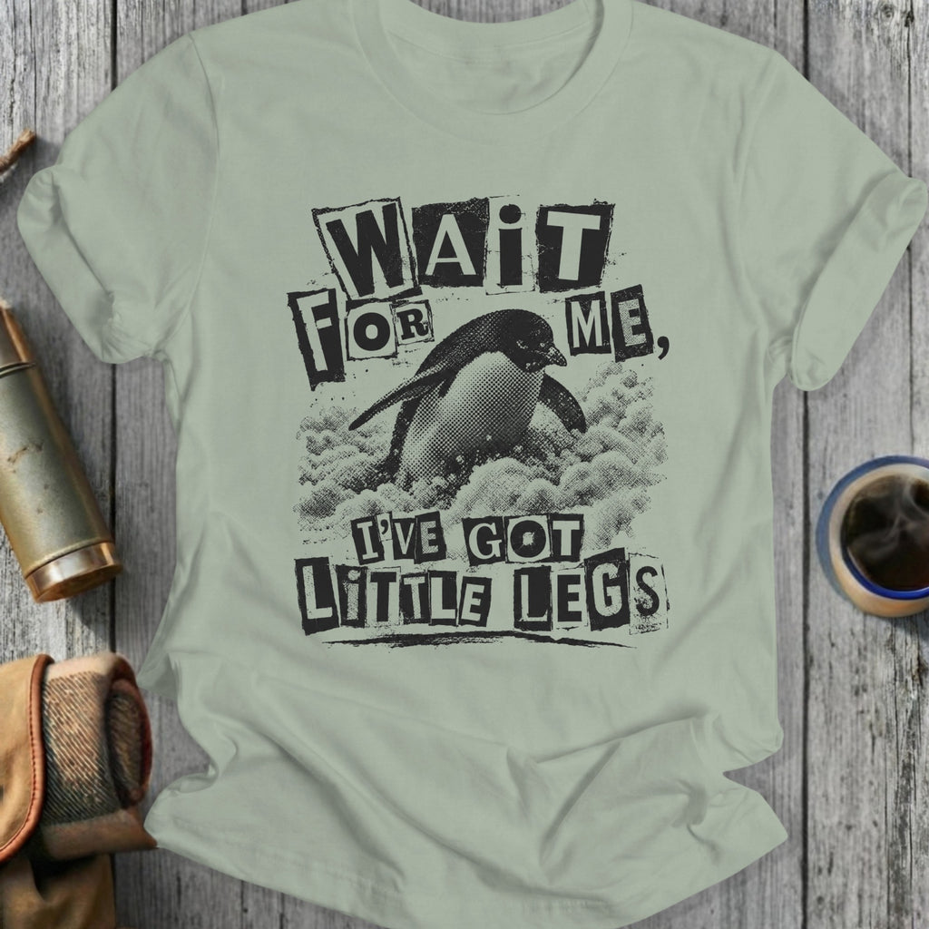 Light gray t-shirt with black text and a penguin: "WAIT FOR ME, I'VE GOT LITTLE LEGS"