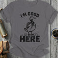 Graphic tee with a duck wearing a backpack, reads "I'M GOOD HERE."