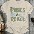 Cream t-shirt with "give me PINES & PEACE outside whenever possible" text.