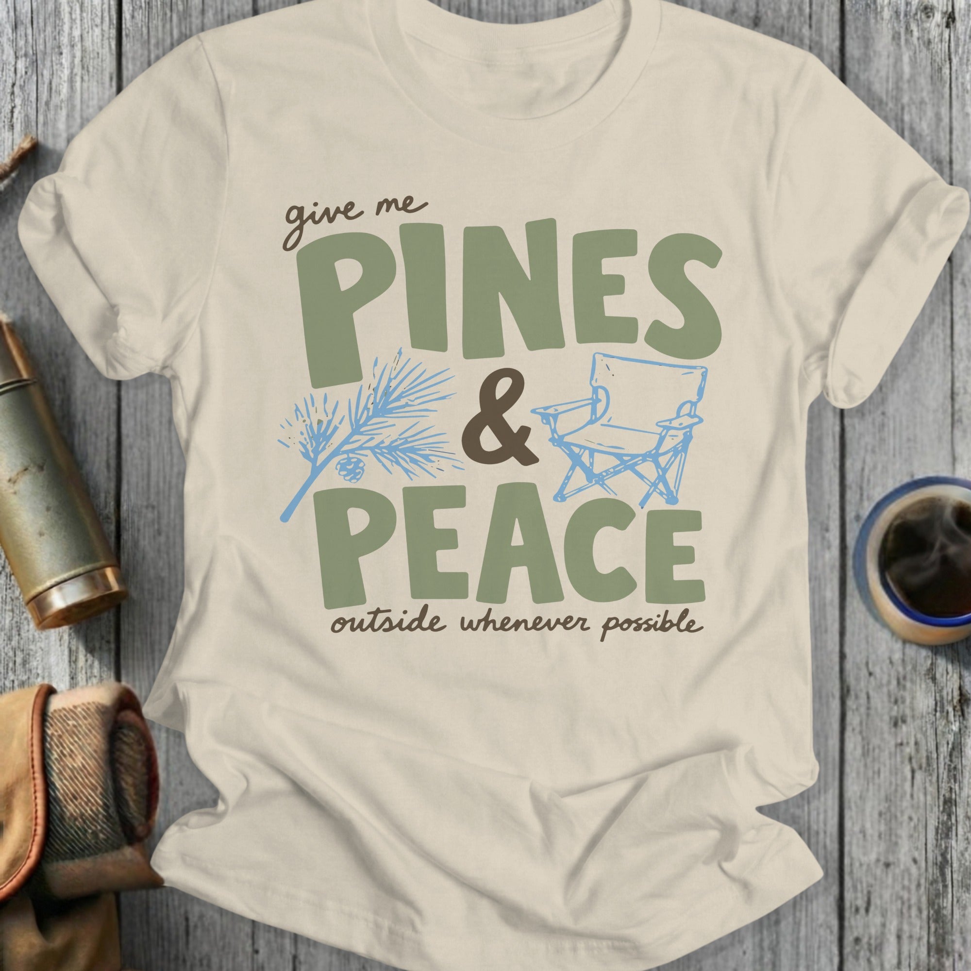 Cream t-shirt with "give me PINES & PEACE outside whenever possible" text.