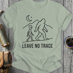 Bigfoot and alien walk under moon with "Leave No Trace" text.