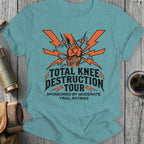 Teal t-shirt with "Total Knee Destruction Tour" text and lightning bolt graphic.