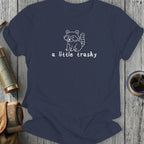 Navy t-shirt with white line drawing of raccoon and text "a little trashy".