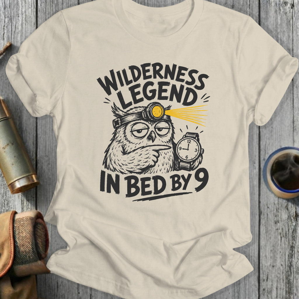 T-shirt with owl graphic and text: Wilderness Legend In Bed By 9.