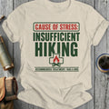 Cream t-shirt with text: cause of stress: insufficient hiking, recommended treatment: take a hike.