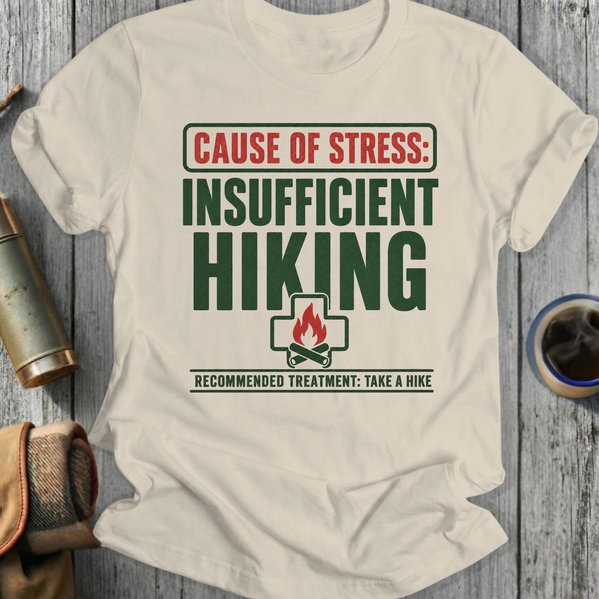 Cream t-shirt with text: cause of stress: insufficient hiking, recommended treatment: take a hike.
