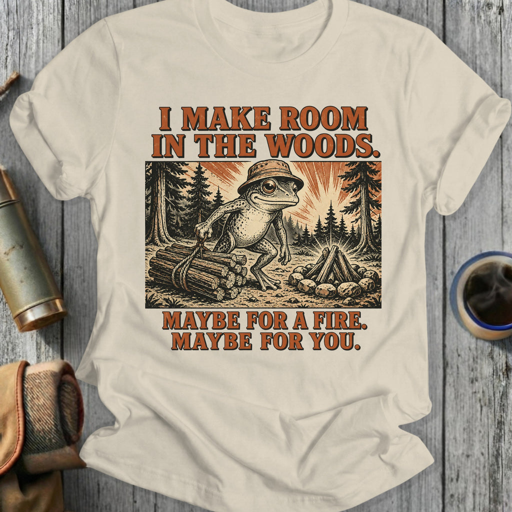 Frog in a hat gathering firewood in a forest with text.