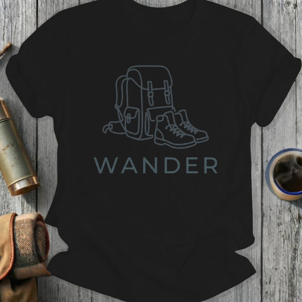 Black t-shirt with line art of a backpack and boots above the word WANDER.