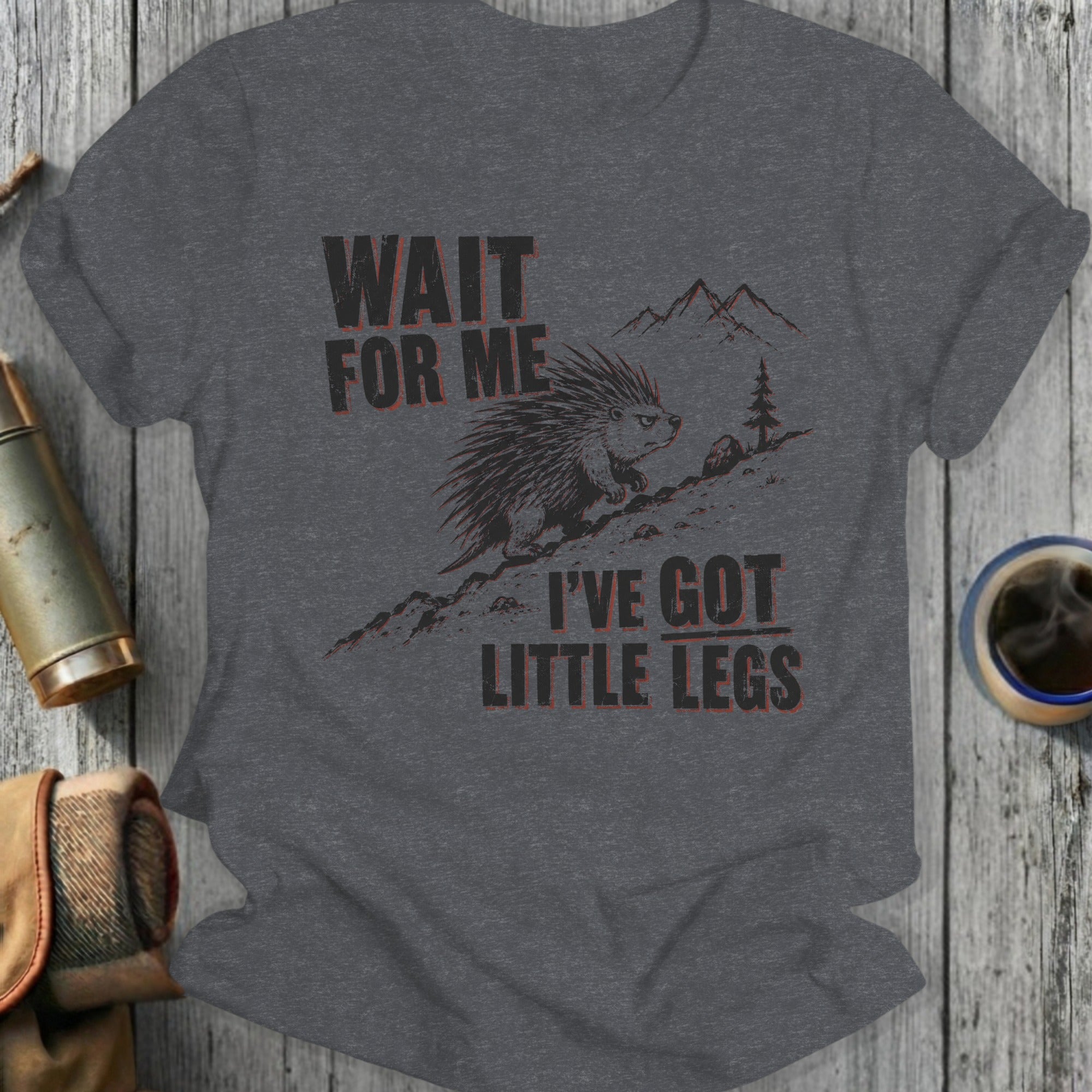 Dark grey t-shirt with a porcupine and text that reads "WAIT FOR ME I'VE GOT LITTLE LEGS".