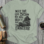 T-shirt with "Not All Who Wander Are Lost, Some Are Just Annoyed" text and boot.