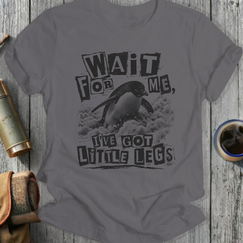 Gray t-shirt with a penguin and text that says "WAIT FOR ME, I'VE GOT LITTLE LEGS."