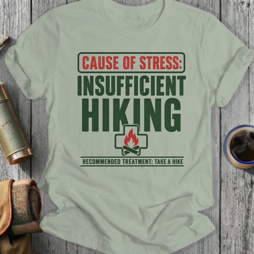 Light green t-shirt with text "CAUSE OF STRESS: INSUFFICIENT HIKING RECOMMENDED TREATMENT: TAKE A HIKE."