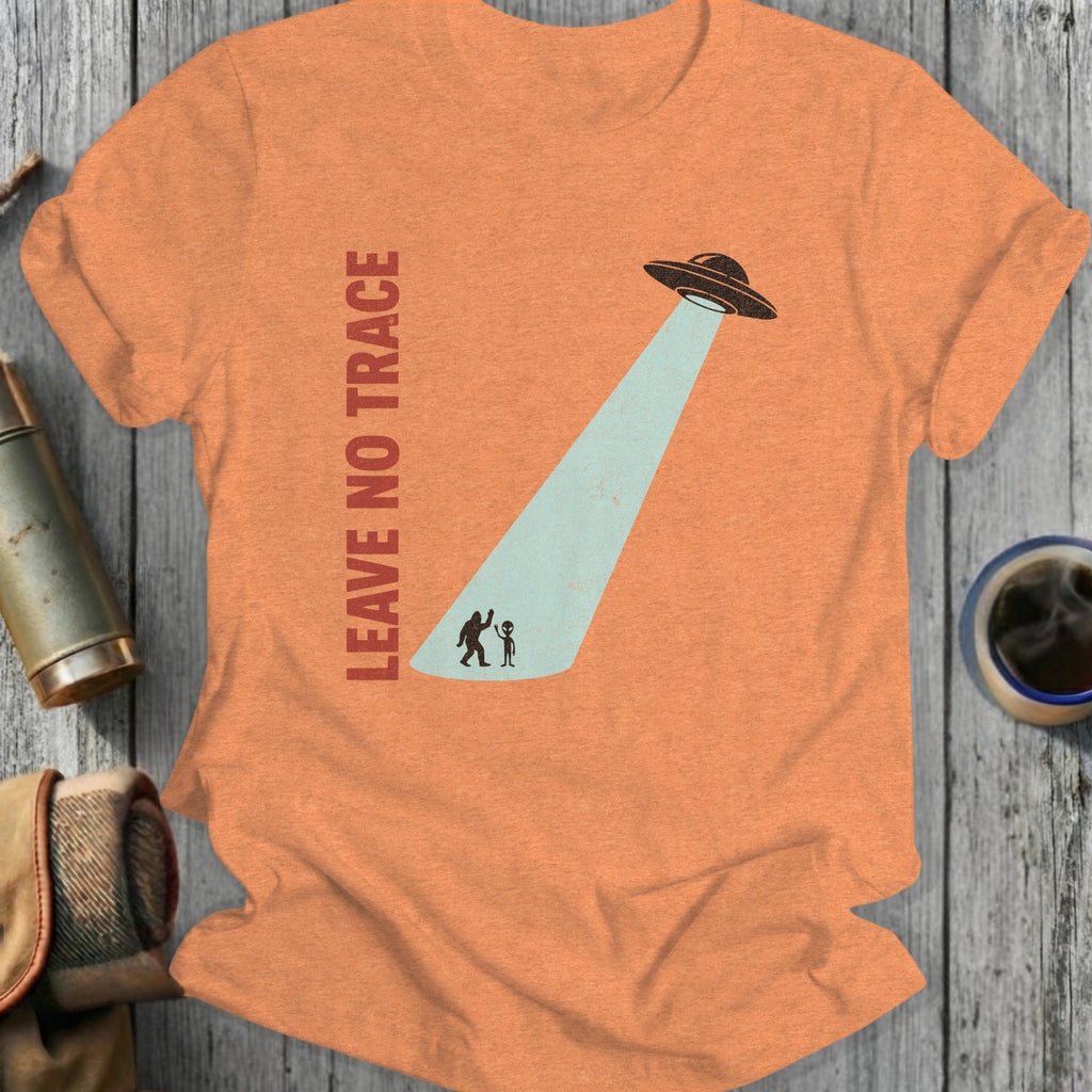 Orange t-shirt with UFO beaming down on Bigfoot and alien.