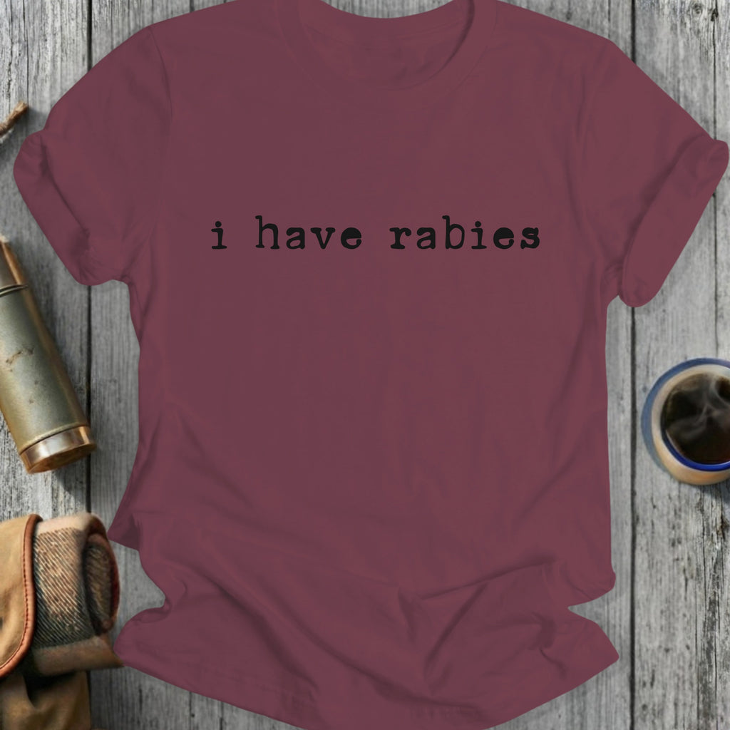 Maroon t-shirt with "i have rabies" printed in black text.
