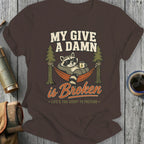 Raccoon in sunglasses relaxing in a hammock with text "My Give A Damn is Broken".