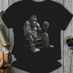 Gorilla in camping chair holding a beer mug.