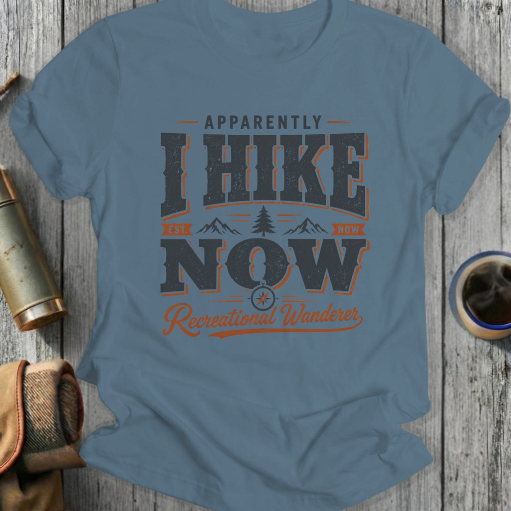 T-shirt with text "I Hike Now", a mountain, and a compass.