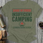 Olive green t-shirt with text "CAUSE OF STRESS: INSUFFICIENT CAMPING".