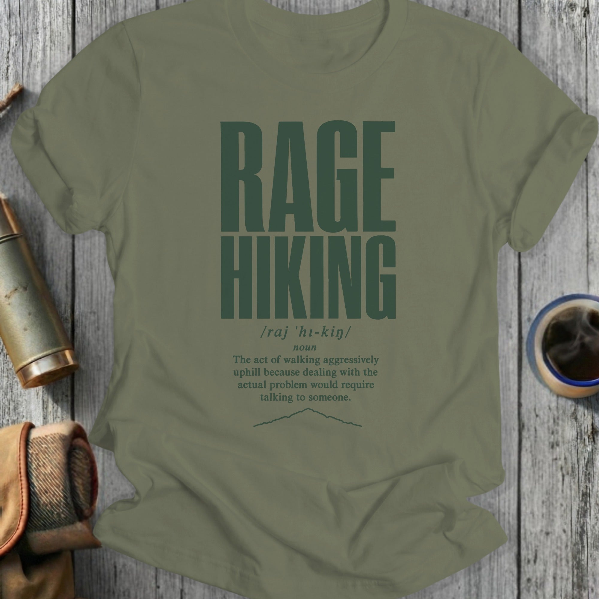 Olive green t-shirt with "RAGE HIKING" definition printed in dark green.