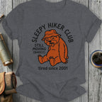 Gray t-shirt with a cartoon sloth wearing a hat, "Sleepy Hiker Club" text.
