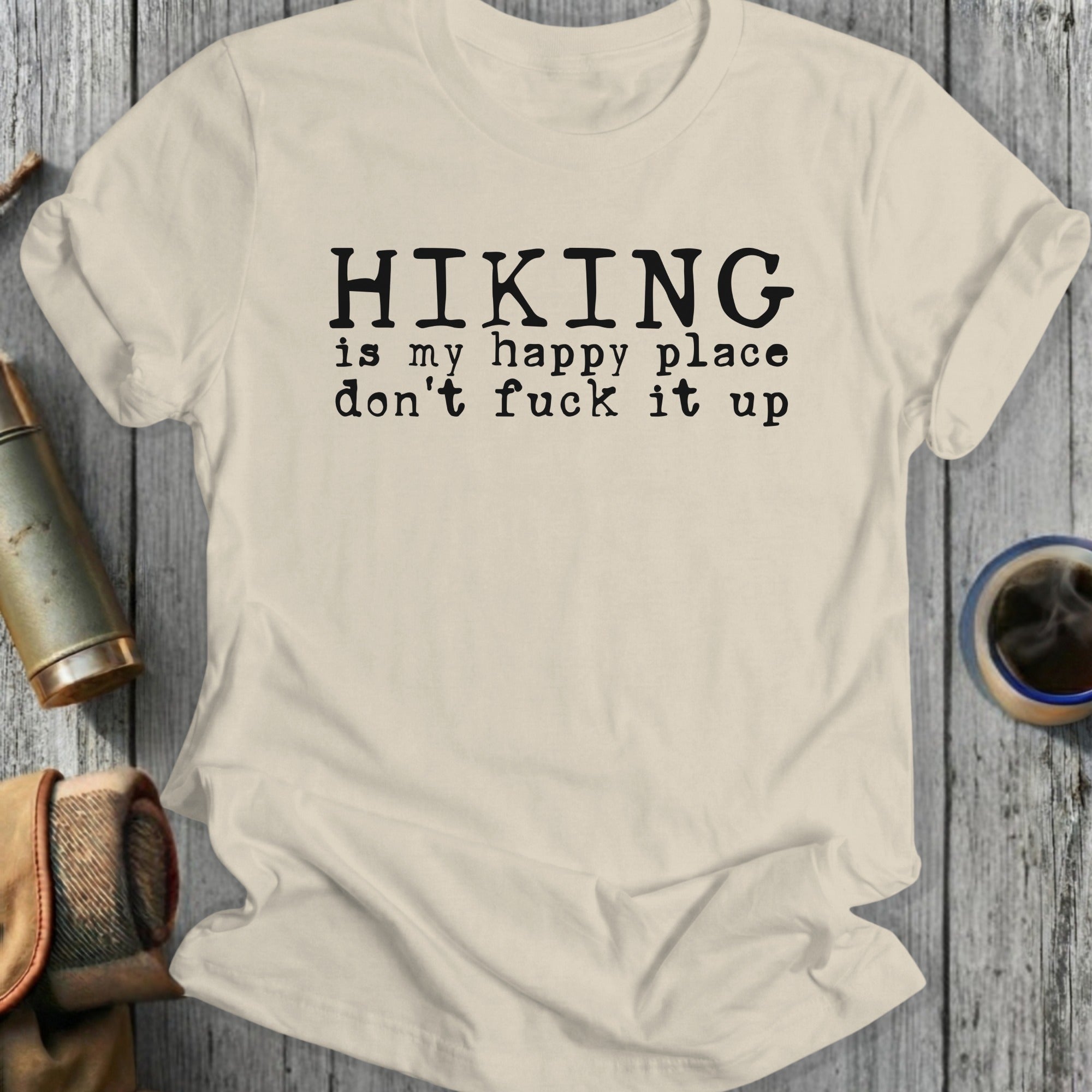 Cream t-shirt with black text: "Hiking is my happy place don't fuck it up."
