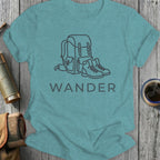 T-shirt with a line drawing of a backpack and boots, and the word "WANDER".