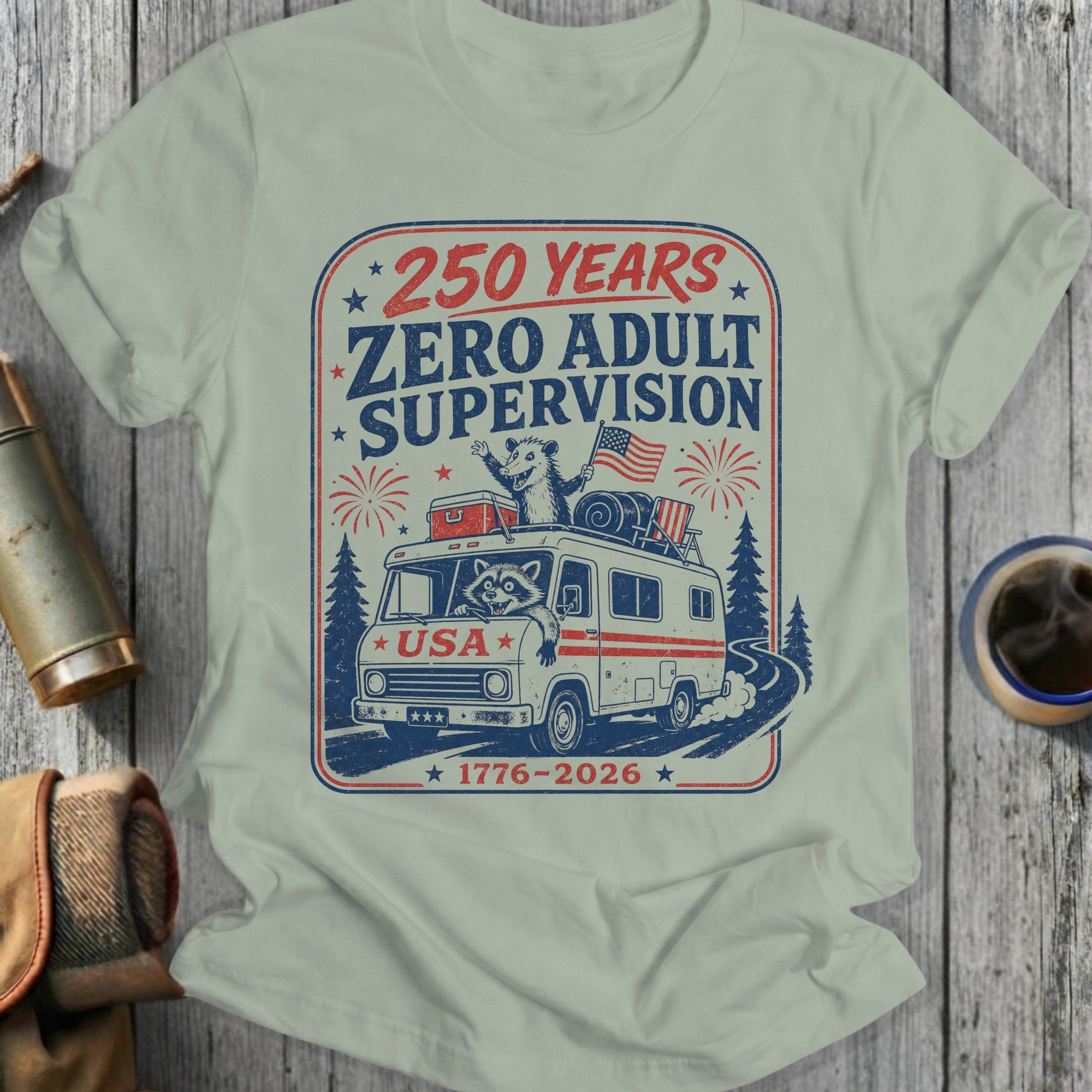 Raccoon in RV on highway with "250 Years Zero Adult Supervision" text.