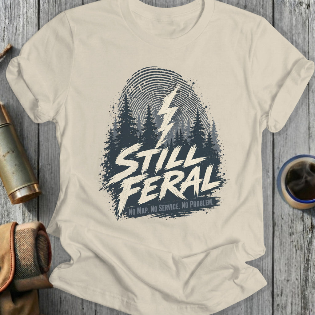 Cream t-shirt with "STILL FERAl NO MAP. NO SERVICE. NO PROBLEM." and a lightning bolt.