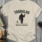 Cream t-shirt with Bigfoot graphic, "TOODALOO" and "MUTHA FUCKAS" text.