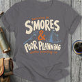 Gray t-shirt with text that reads "Surviving on S'mores & Poor Planning weather permitting-ish".