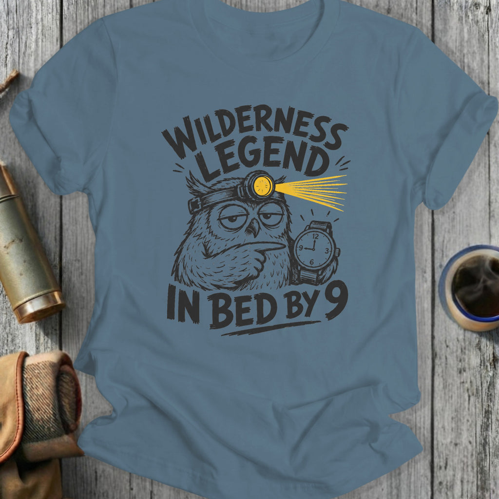 Blue t-shirt with text "WILDERNESS LEGEND IN BED BY 9" and an owl graphic.