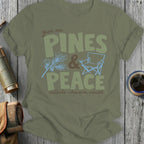 Olive green t-shirt with text "give me PINES & PEACE outside whenever possible".