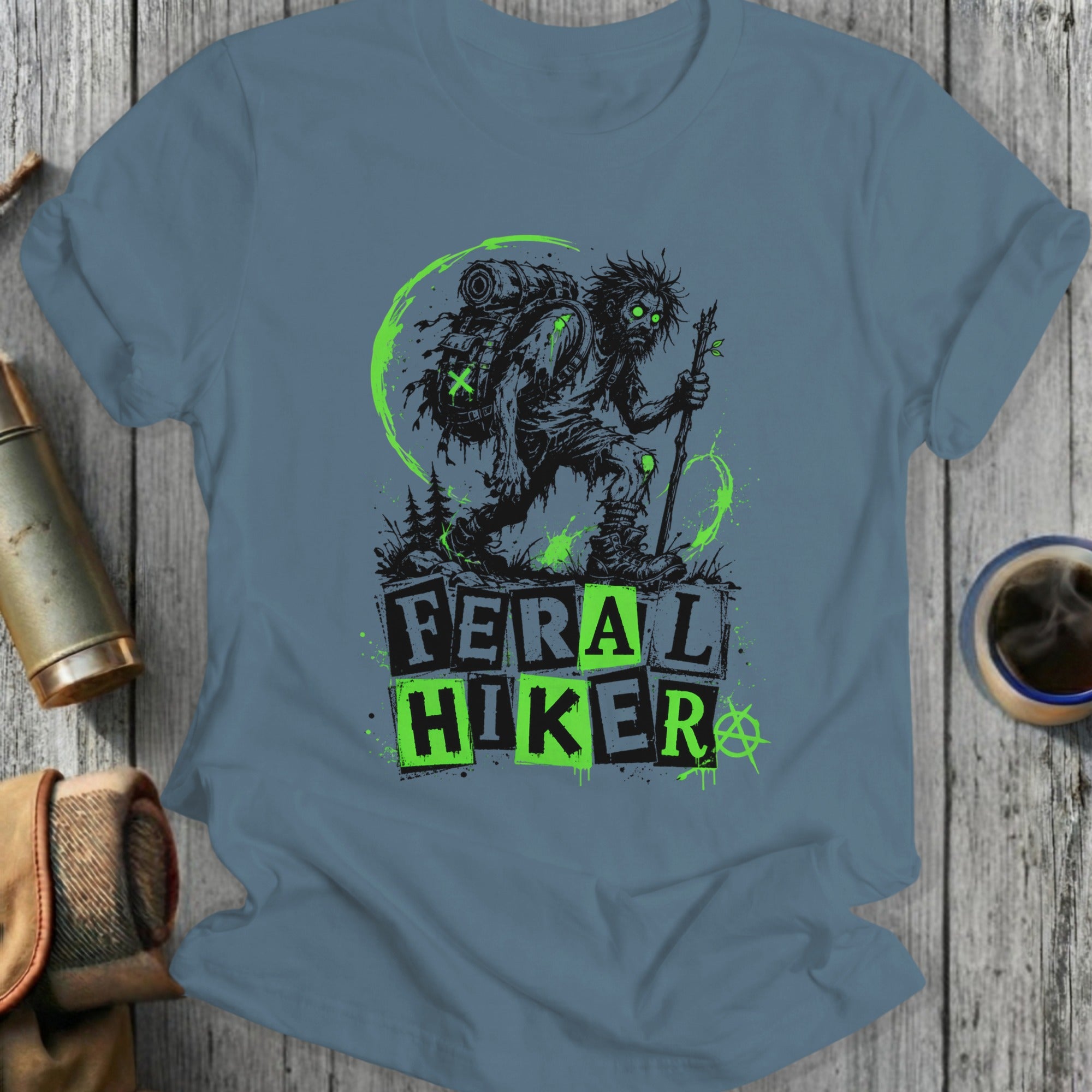 Feral Hiker graphic with monster, backpack, and staff.