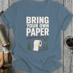 T-shirt with "Bring Your Own Paper" text and toilet paper roll hanging from a tree.
