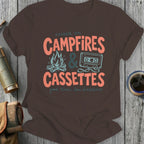 Brown t-shirt with "Raised on Campfires & Cassettes" graphic.