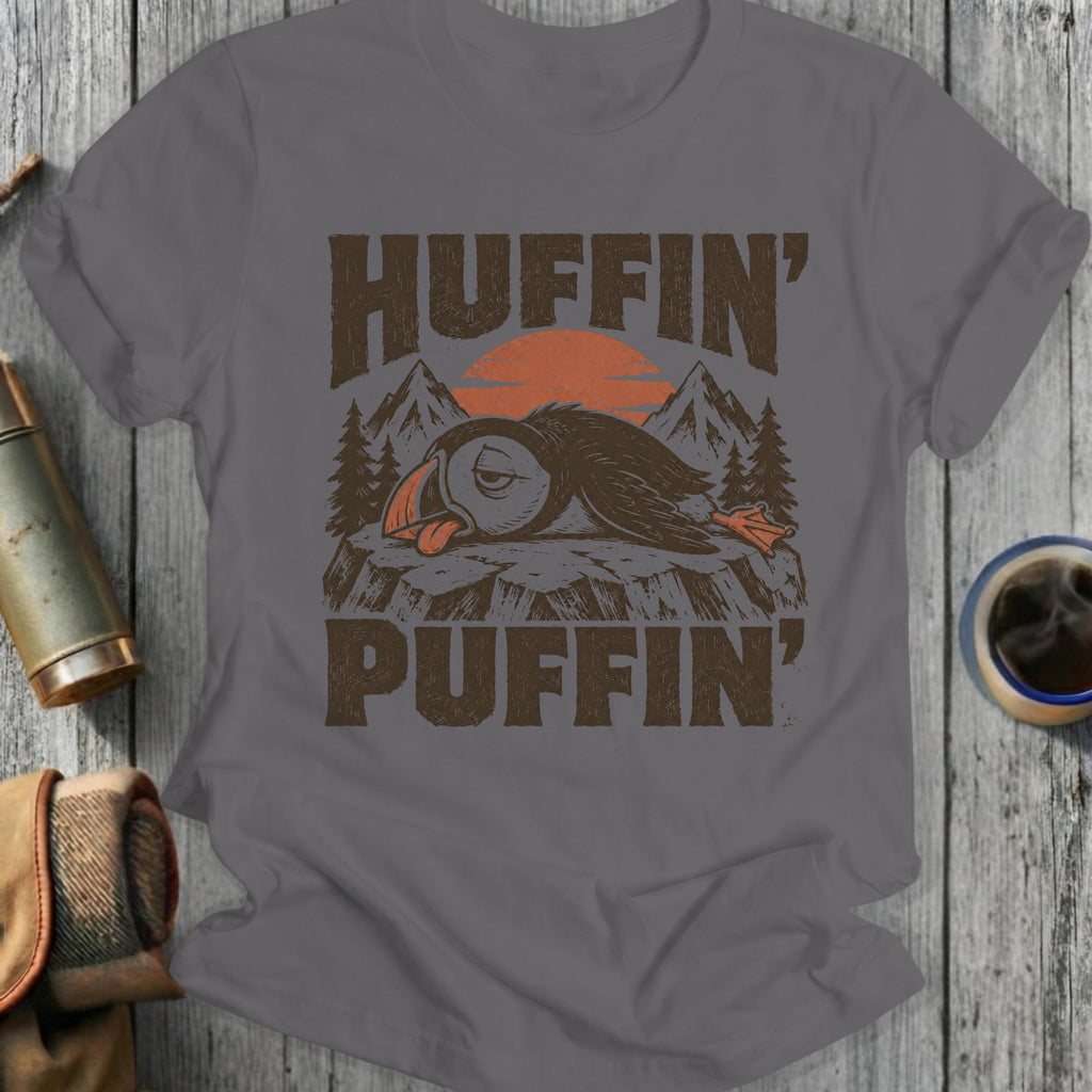 Huffin' Puffin text with a sleeping puffin and mountains graphic.