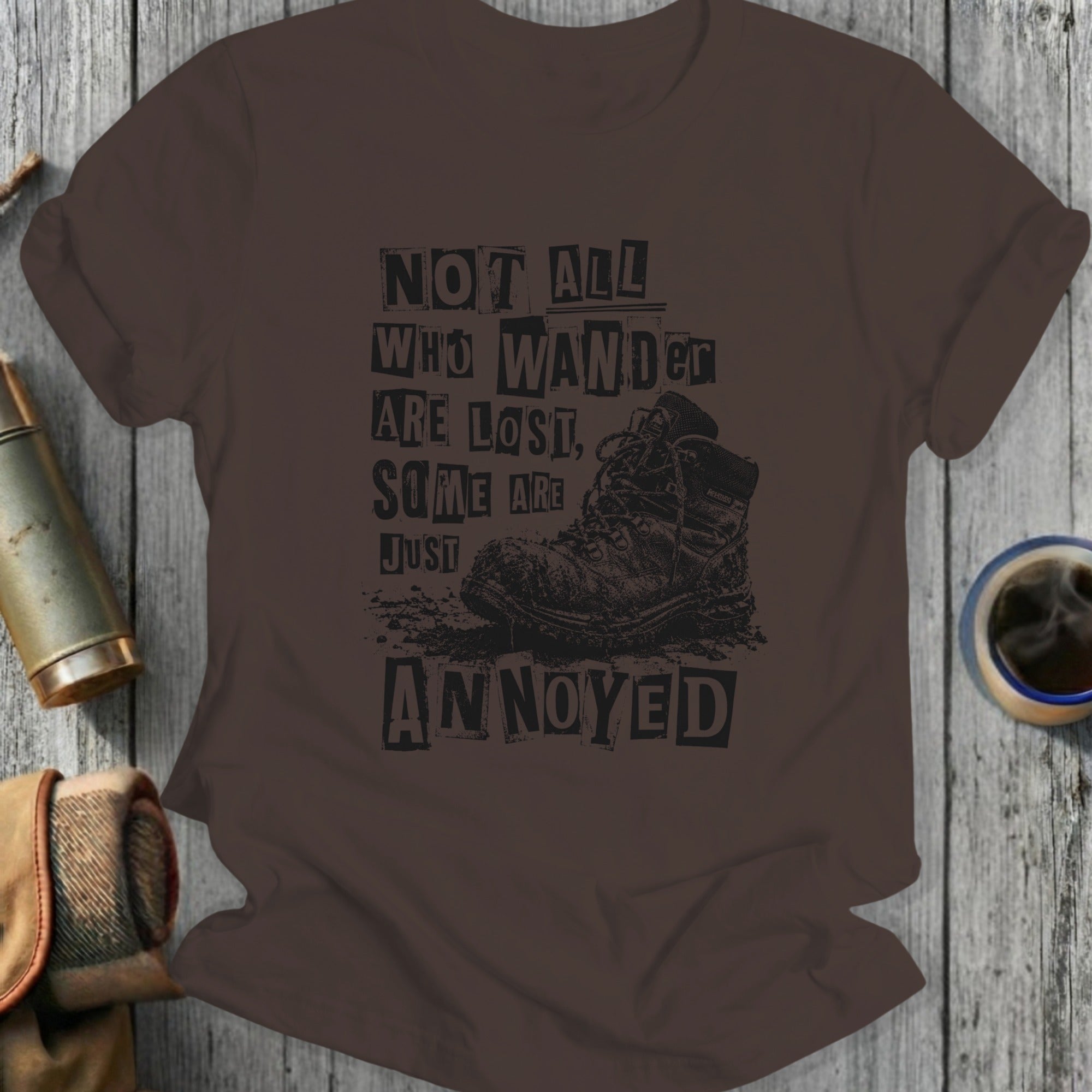 T-shirt with distressed hiking boot and "Not all who wander are lost, some are just annoyed" text.