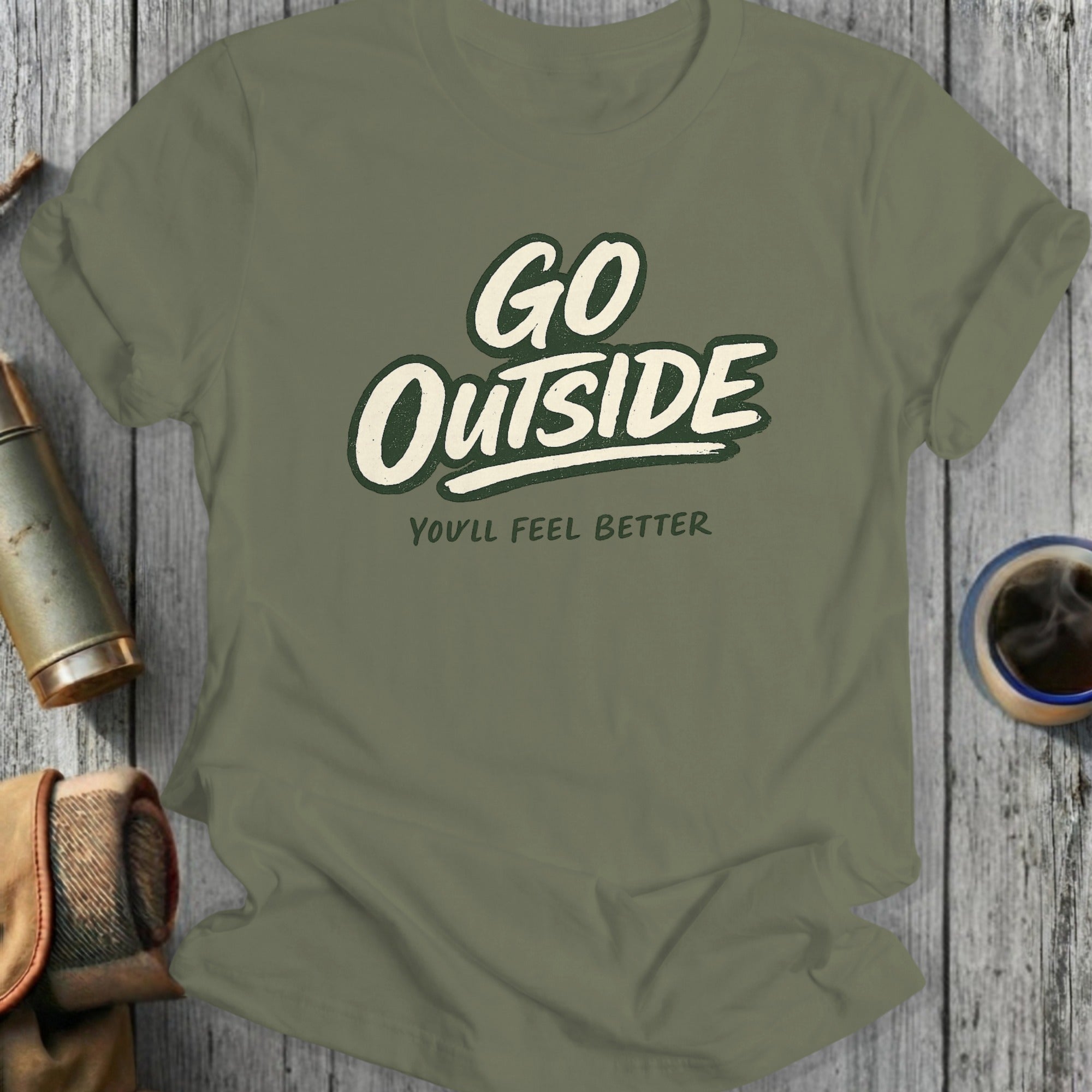 Green t-shirt with "GO OUTSIDE YOU'LL FEEL BETTER" text.