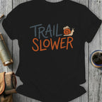Black t-shirt with "TRAIL SLOWER" text and a snail graphic.