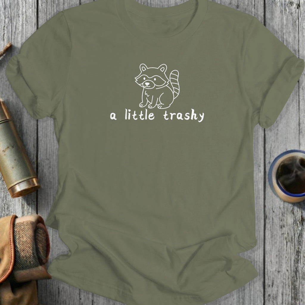 Olive green t-shirt with white outline of a raccoon and text "a little trashy".