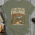 T-shirt with "I Came For The Foliage" and "The Hiking Was Unfortunate" text and mountain scene.