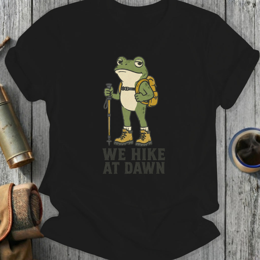 Black t-shirt with frog hiker graphic and text "WE HIKE AT DAWN".