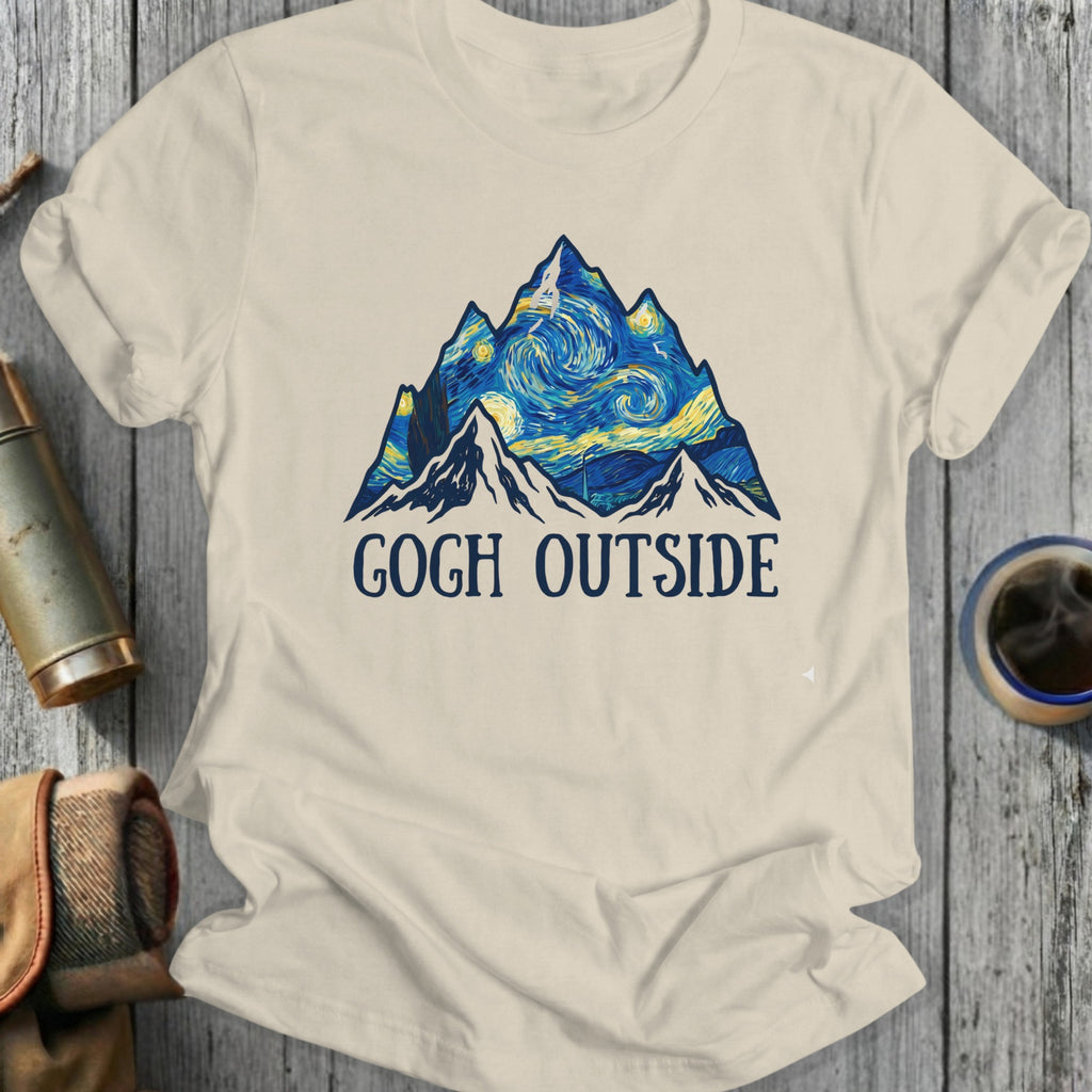 Mountains with starry sky, "Gogh Outside" text on cream t-shirt.