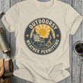 Cream t-shirt with distressed circular graphic of chair, campfire, and sun with text "OUTDOORSY WEATHER PERMITTING".