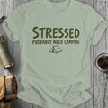 Light green t-shirt with "STRESSED PROBABLY NEED CAMPING" and a tent graphic.