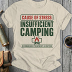 Cream shirt with green text: "Cause of stress: Insufficient camping. Recommended treatment: Go outside."